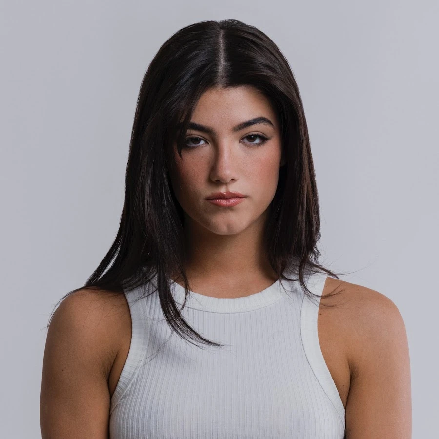 Editorial gallery of Charli D'Amelio styled in soft spring wardrobes featuring peach, mint, and buttery neutrals, highlighting peach sorbet, seafoam, buttercream, leafy green, and rose beige.