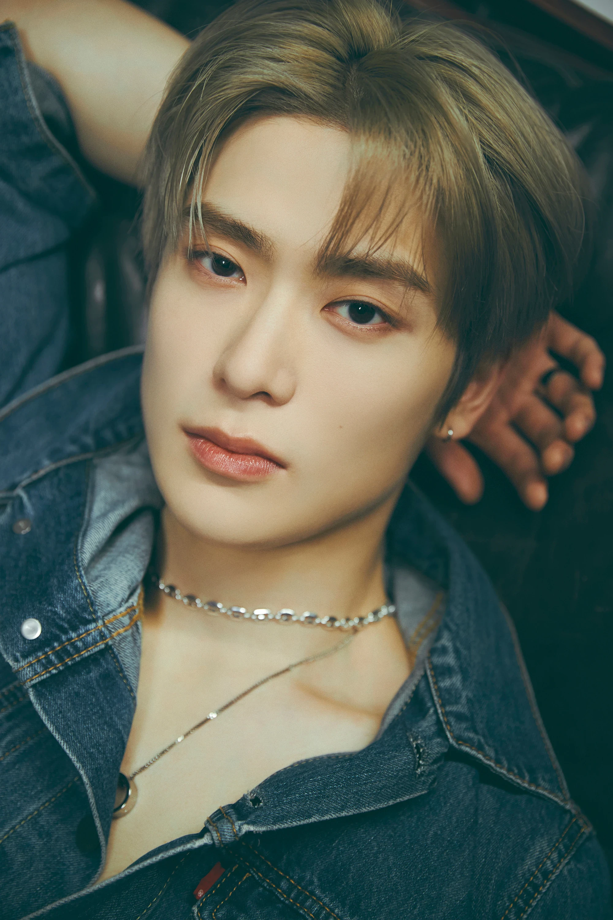 Editorial gallery of Jaehyun (NCT) styled in cool winter outfits featuring sapphire, amethyst, and inky neutrals, highlighting glacier blue, raspberry, graphite, arctic white, and ultra black.