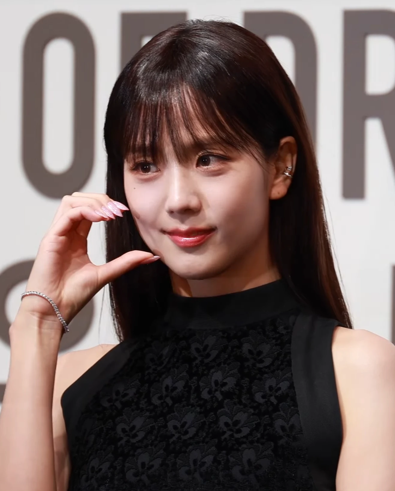 Jisoo (BLACKPINK) wearing high-voltage winter ensembles with electric hues and chrome accents, showcasing fuchsia, royal blue, silver chrome, acid lime, and deep plum from the Vibrant Winter palette.