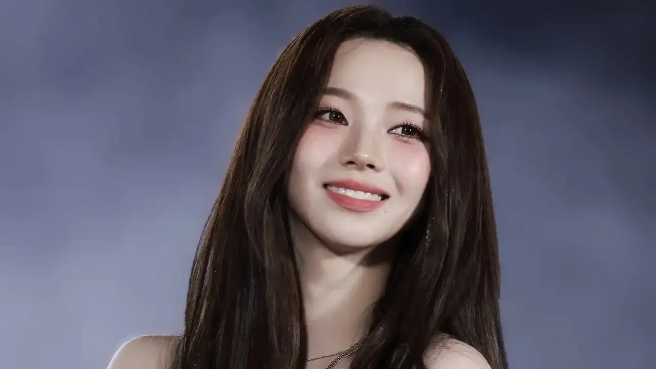 Editorial gallery of Karina (aespa) styled in bright winter looks with electric blues, magenta accents, and polished black, highlighting electric cobalt, icy magenta, optic white, chrome silver, and inky black.