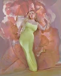 Editorial gallery of Nicola Coughlan styled in true summer outfits mixing navy, raspberry, and soft lavender, highlighting powder blue, soft lilac, rose quartz, silvery sage, and midnight plum.