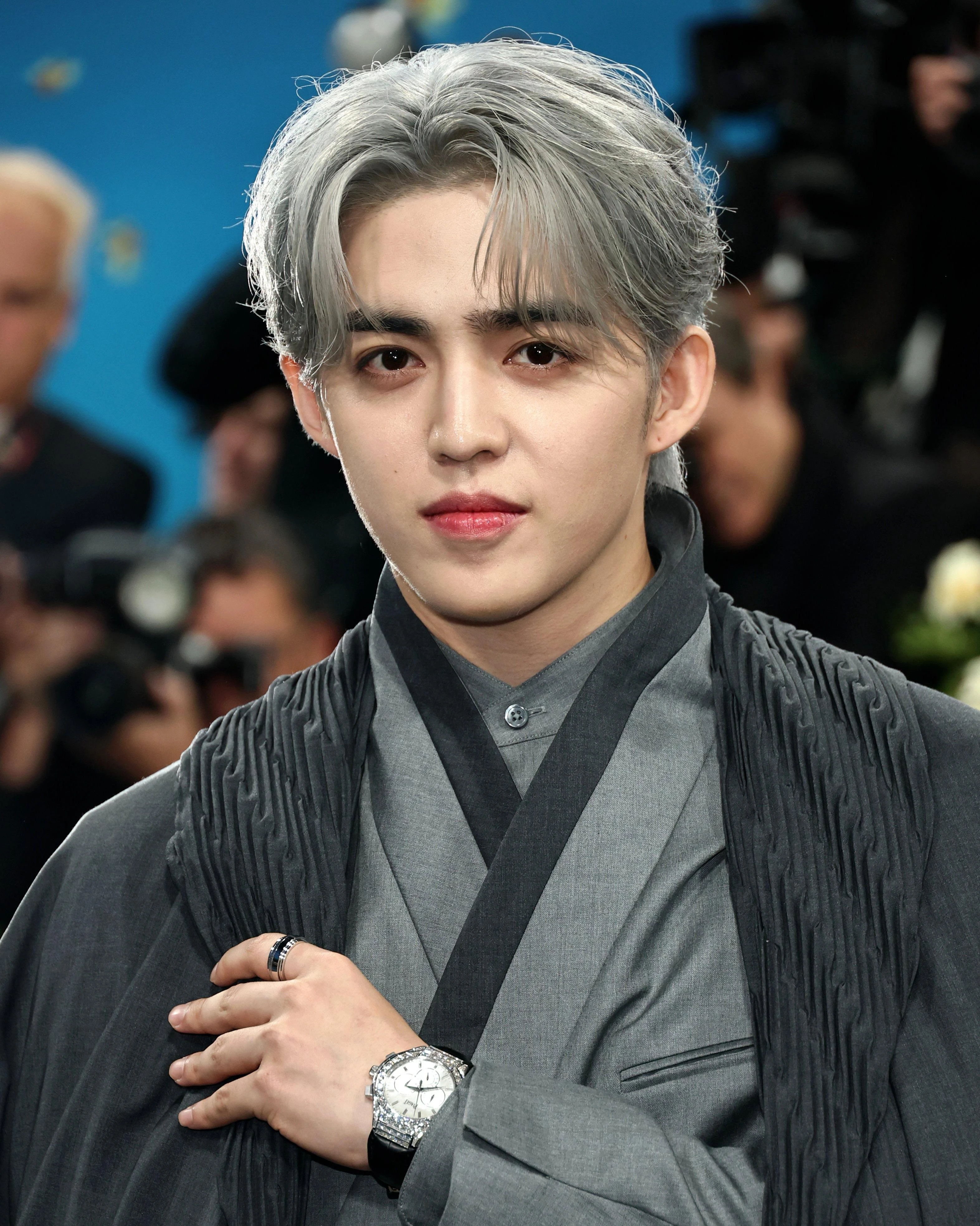 S.Coups (SEVENTEEN) wearing cool jewel-toned gowns with sharp contrast, showcasing glacier blue, raspberry, graphite, arctic white, and ultra black from the Cool Winter palette.