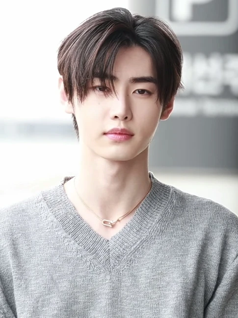 Sunghoon (ENHYPEN) wearing saturated autumn looks with molten metallics, showcasing burnt sienna, chartreuse, emerald, molten gold, and espresso from the Vibrant Autumn palette.