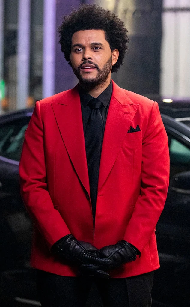 The Weeknd wearing high-contrast electric brights paired with sharp tailoring, showcasing ultra violet, neon fuchsia, electric jade, polished pewter, and onyx from the Bold Winter palette.