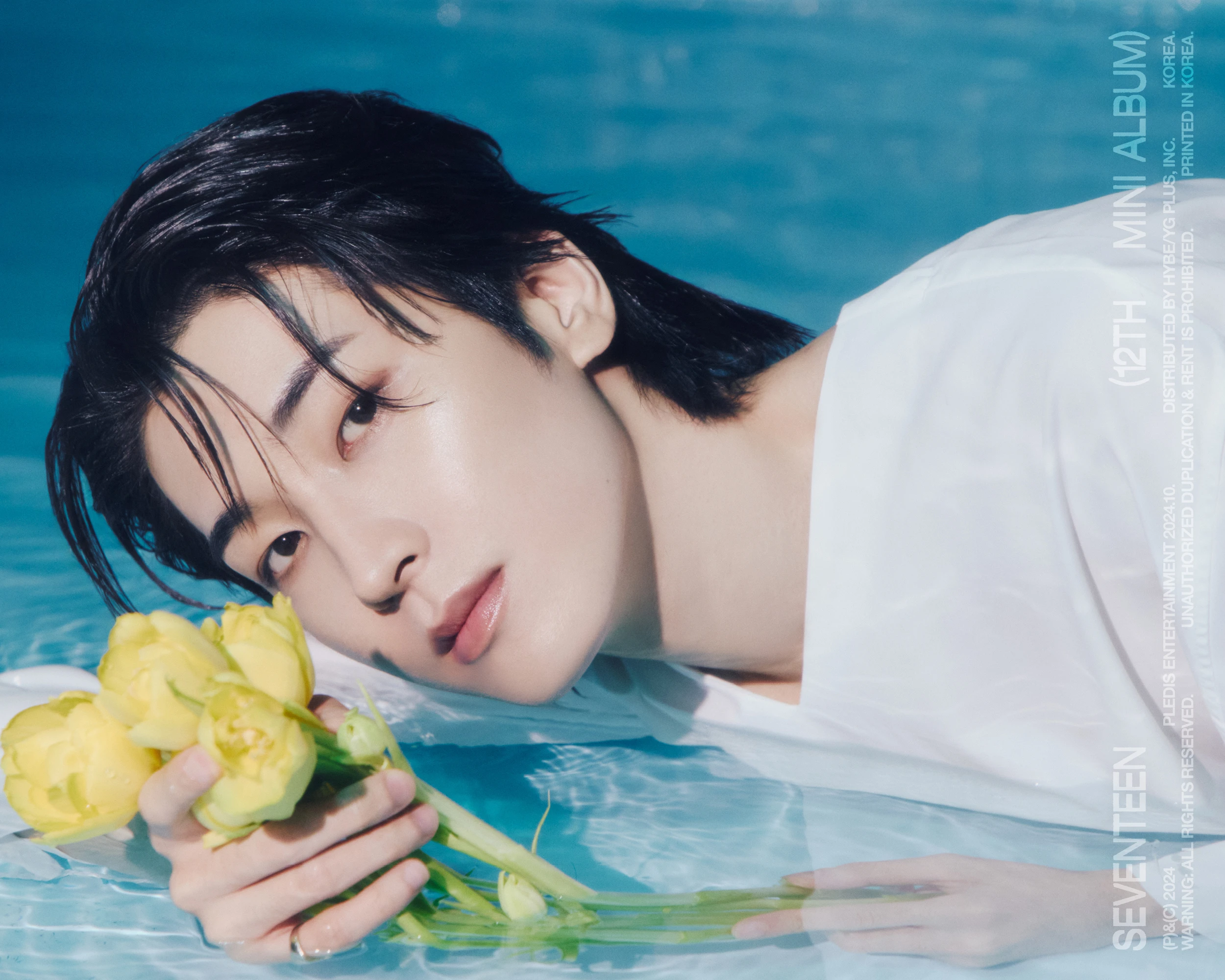 Editorial gallery of Wonwoo (SEVENTEEN) styled in bold winter ensembles mixing neon pops, inky black, and chrome sparkle, highlighting ultra violet, neon fuchsia, electric jade, polished pewter, and onyx.